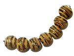 11106102 - Seven Transparent Brown w/Beige Strips Lentil Beads