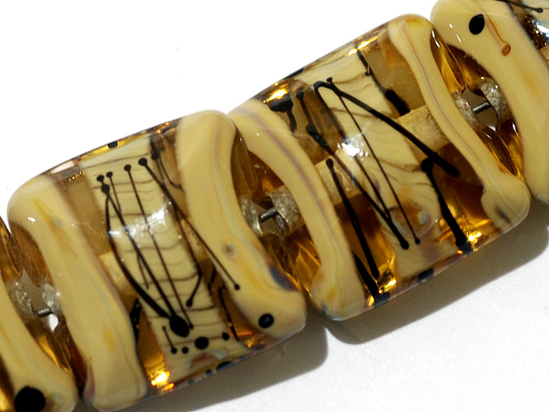 11106104 - Seven Transparent Brown w/Beige Strips Pillow Beads