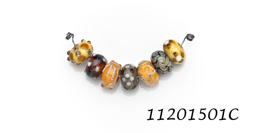 11201501C - Seven Dark Yellow w/Silver Stringers Rondelle Beads