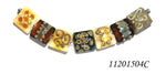11201504C - Seven Dark Yellow w/Silver Stringers Pillow Beads