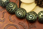 11203802 - Seven Green Pearl Surface w/Black String Lentil Beads
