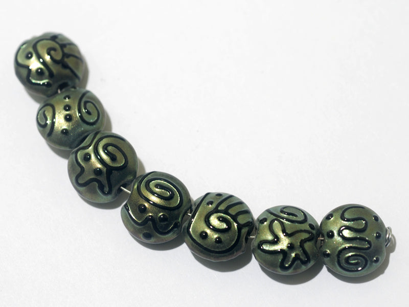 11203802 - Seven Green Pearl Surface w/Black String Lentil Beads