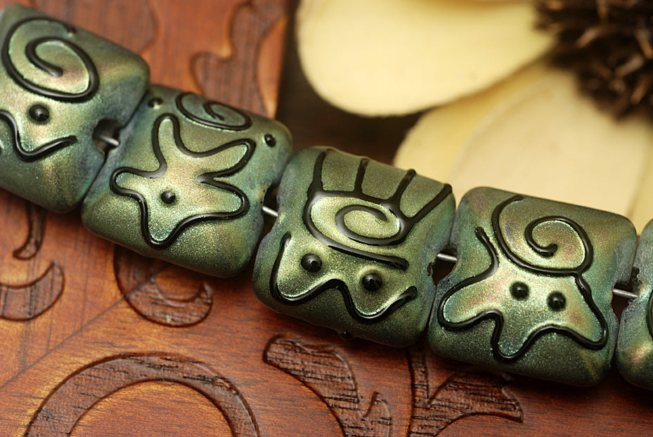 11203804 - Seven Green Pearl Surface w/Black Pillow Beads