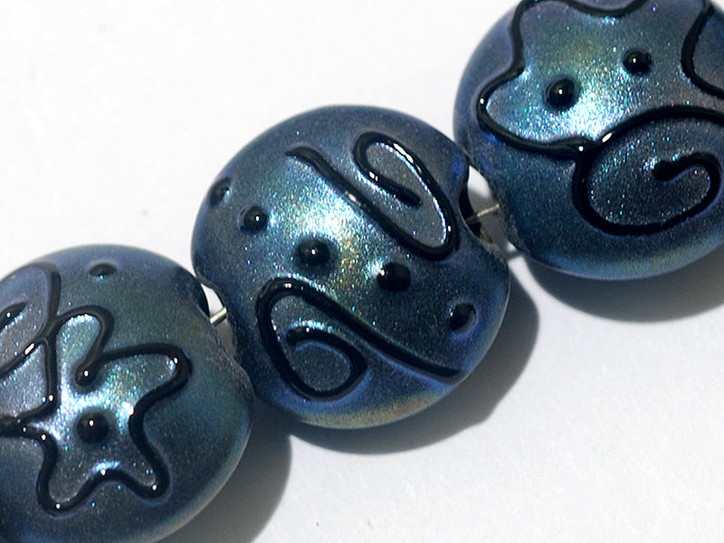11204302 - Seven Blue Pearl Surface w/Black String Lentil Beads