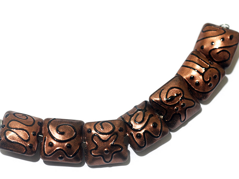 11204404 - Seven Copper Pearl Surface w/Black Swirl Pillow Beads