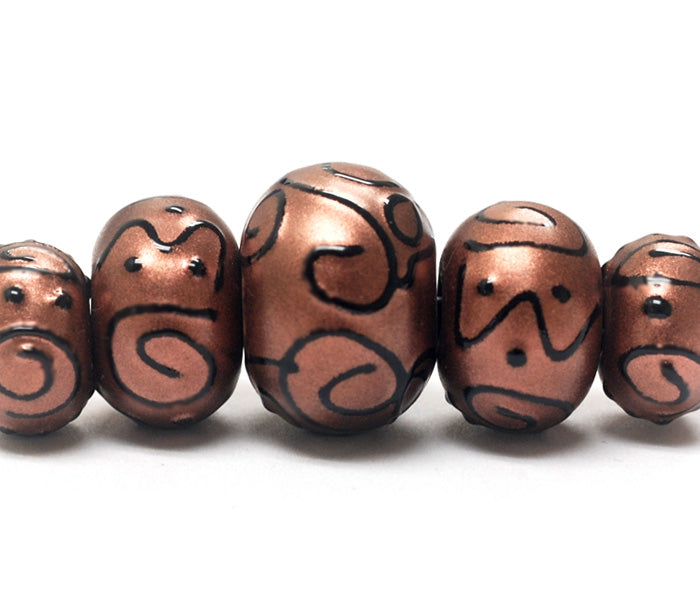 11204411 - Five Graduated Copper Pearl Surface w/Black Rondelle Beads
