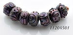 11204501 - Seven Light Purple Pearl Surface Rondelle Beads
