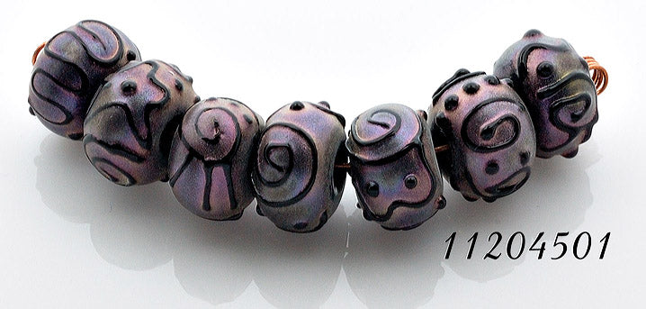 11204501 - Seven Light Purple Pearl Surface Rondelle Beads