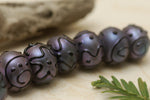 11204701 - Seven Purple Pearl Surface Rondelle Beads