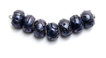 11204701 - Seven Purple Pearl Surface Rondelle Beads