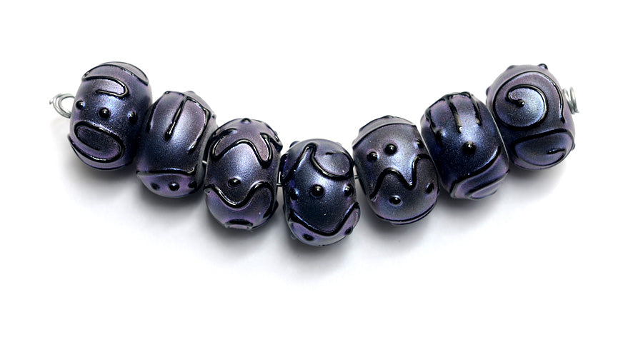 11204701 - Seven Purple Pearl Surface Rondelle Beads