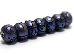 11204701 - Seven Purple Pearl Surface Rondelle Beads