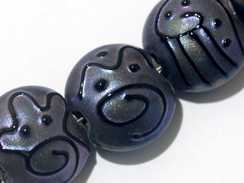 11204702 - Seven Purple Pearl Surface Lentil Beads