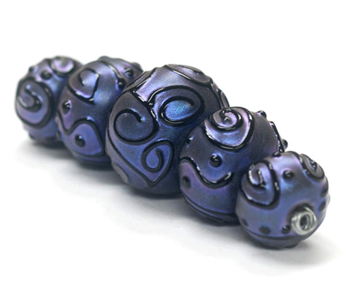 11204711 - Five Graduated Purple Pearl Surface Rondelle Beads