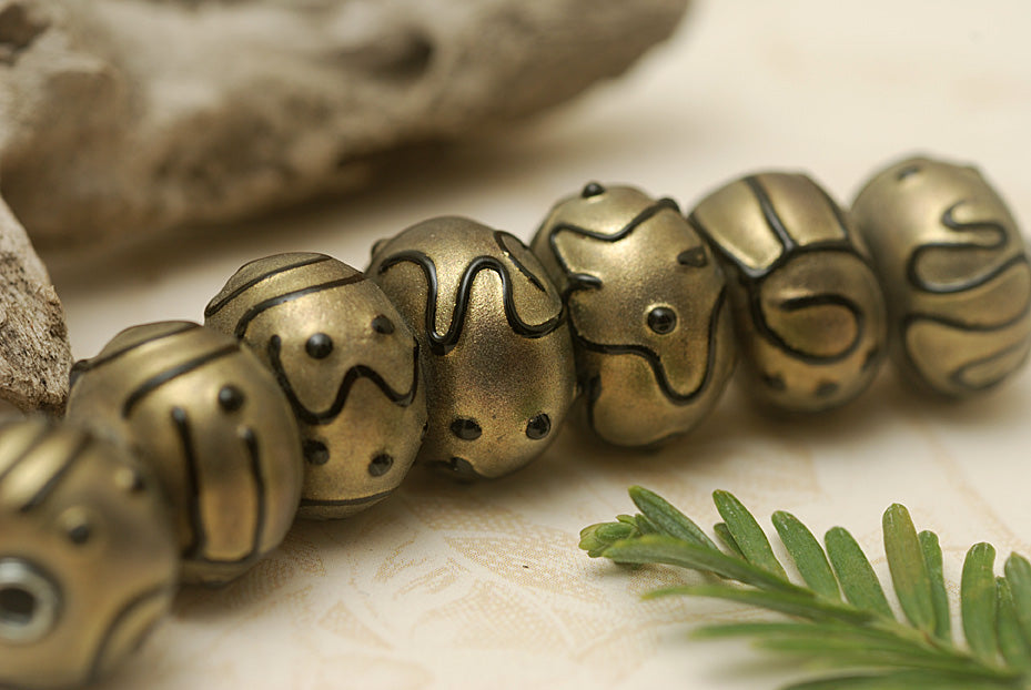 11204801 - Seven Golden Pearl Surface w/Black Rondelle Beads