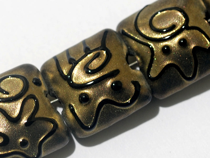 11204804 - Seven Golden Pearl Surface w/Black Pillow Beads