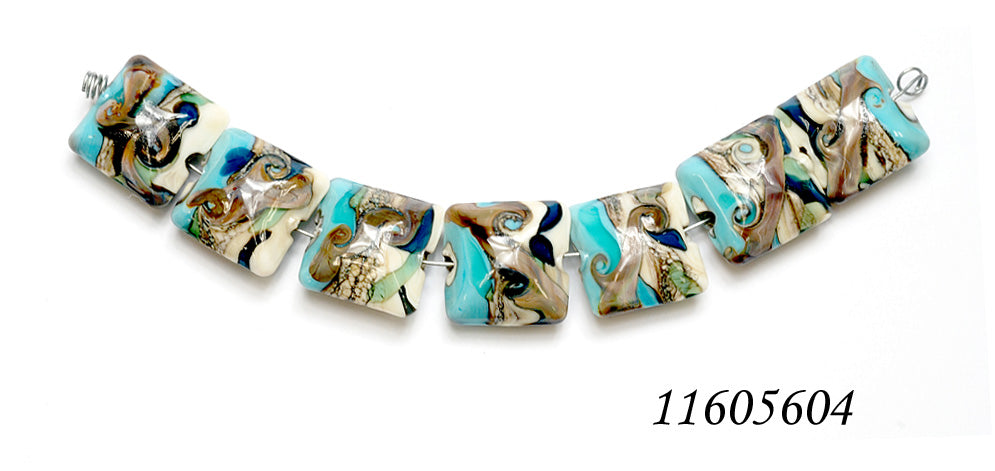 11605604 - Seven Turquoise Silver Ivory Pillow Beads