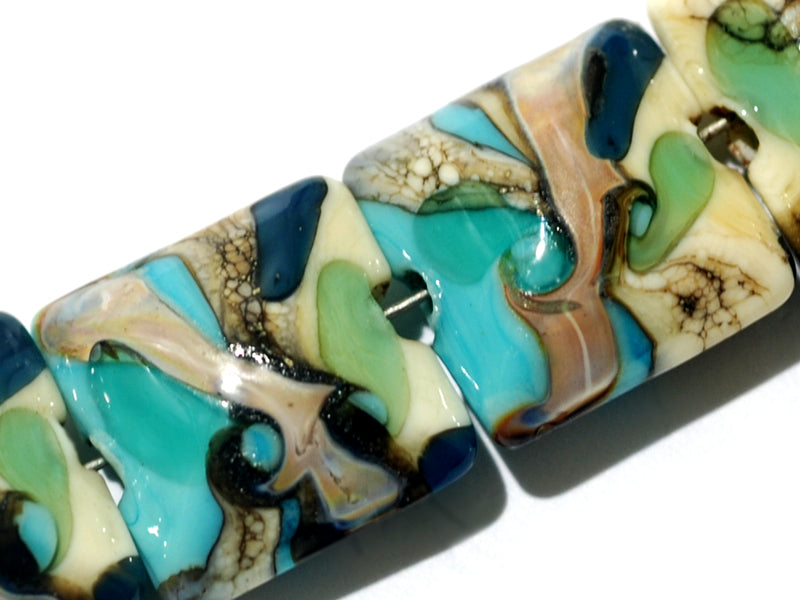 11605604 - Seven Turquoise Silver Ivory Pillow Beads
