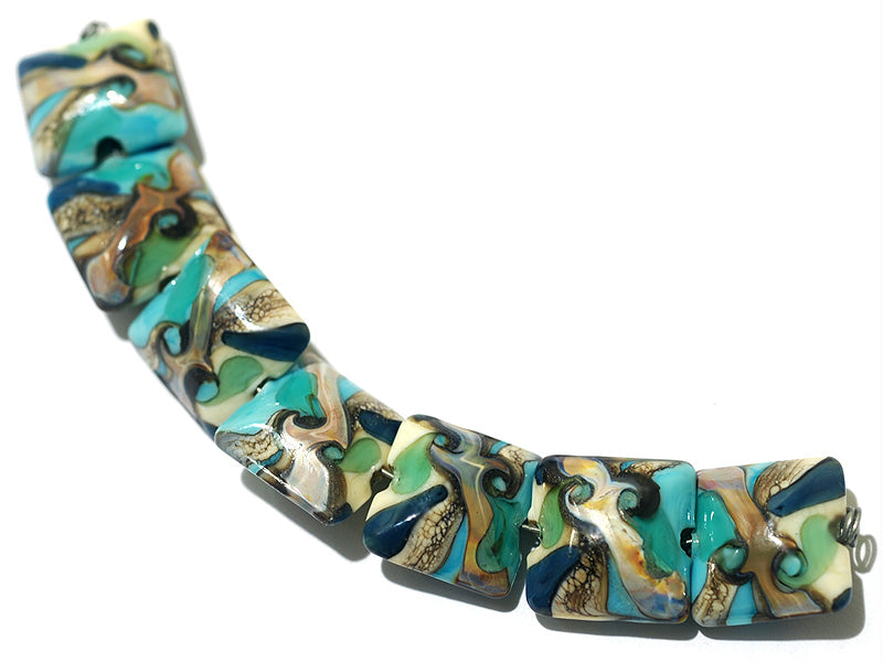 11605604 - Seven Turquoise Silver Ivory Pillow Beads