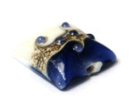 11808904 - White w/Ink Blue Pillow Focal Bead