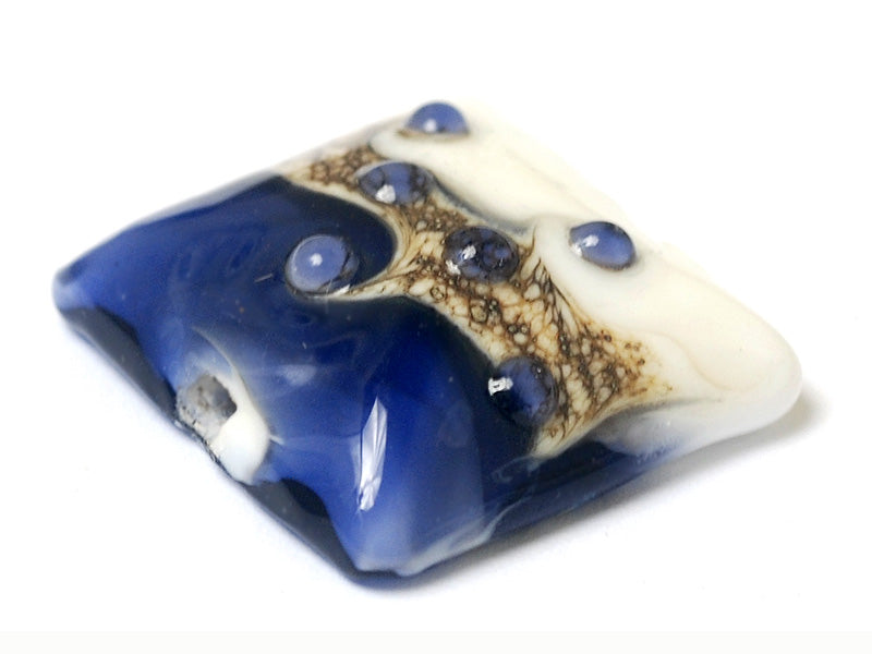 11808904 - White w/Ink Blue Pillow Focal Bead