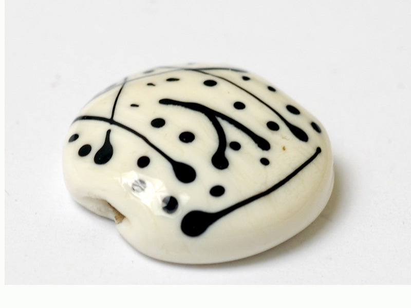 11812702 - Ivory w/Black Lentil Focal Bead