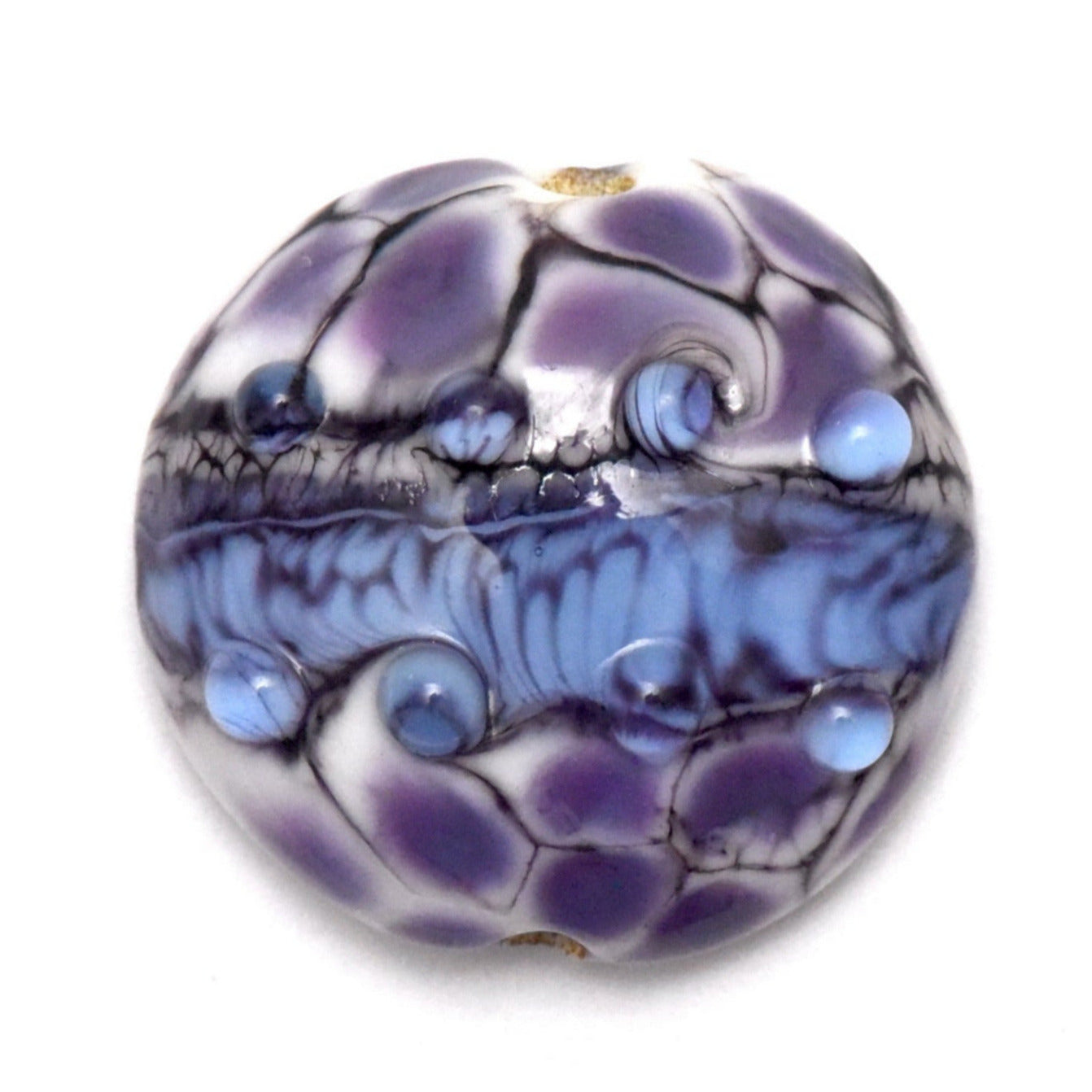 Purple and blue glass bead on a white background
