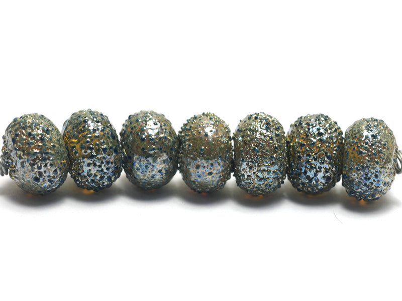 40101001 - Seven Golden Green Metallic Rondelle Beads