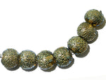 40101002 - Seven Golden Green Metallic Lentil Beads