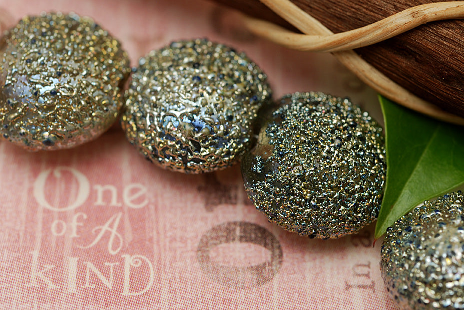 40101012 - Four Golden Green Metallic Lentil Beads