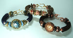 10304601 Coiled Bangle by Sandra Lupo