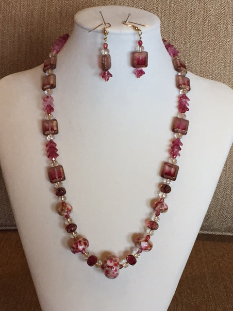 LC- Necklace with 11106311 Graduated Red & Ivory w/Beige Dot Rondelle Beads
