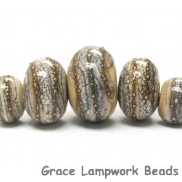 10306011 - Five Graduated Dark Ivory w/Silver Rondelle Beads
