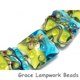 10406004 - Seven Blue w/Green Strip Pillow Beads