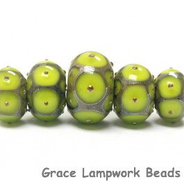 10505011 - Five Pear Green w/Metal Dots Graduated Rondelle Beads