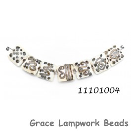 11101004 - Seven Ivory w/Beige Stringer Pillow Beads
