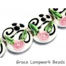 10107512 - Four White w/Black & Pink Flowers Lentil Beads