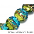 10406002 - Seven Blue w/Green Strip Lentil Beads