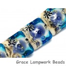 10407104 - Seven Transparent Blue Seashell Pillow Beads