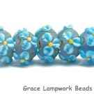 10411101 - Seven Blue Floral on Frosted Glass Rondelle Beads