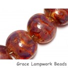 10601602 - Seven Orange  & Purple Lentil Beads