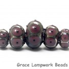 10601711 - Five Graduated Plum Rondelle Beads