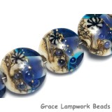 10407102 - Seven Transparent Blue Seashell Lentil Beads