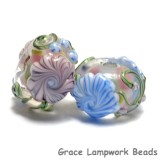 11005401 - Seven Light Pink w/Blue Floral Rondelle Beads