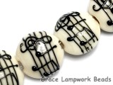 10306212 - Four Musical Notes Lentil Beads