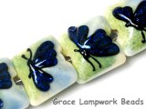 10412914 - Four Blue Sparkle Garden Butterfly Pillow Beads