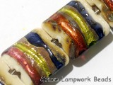 11005604 - Seven Multi-colored & Ivory Pillow Beads