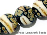 11105002 - Seven Black/Ivory & Beige Lentil Beads