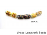 11201503 - Six Dark Yellow w/Silver Stringers Mini Kalera Beads