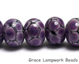 10605301 - Seven Purple Honey Rondelle Beads